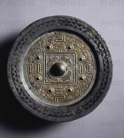 TLV Mirror with Gilt Surface, 2nd century BC. China, Western Han dynasty (202 BC-AD 9). Gilt bronze; diameter: 14.2 cm (5 9/16 in.); overall: 1.2 cm (1/2 in.); rim: 0.6 cm (1/4 in.).