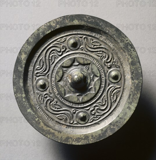 Mirror with Four Nipples, Quasi-Dragons, and Birds, late 3rd Century BC - early 1st Century. China, Western Han dynasty (202 BC-AD 9). Bronze; diameter: 8.9 cm (3 1/2 in.); overall: 0.8 cm (5/16 in.); rim: 0.3 cm (1/8 in.).