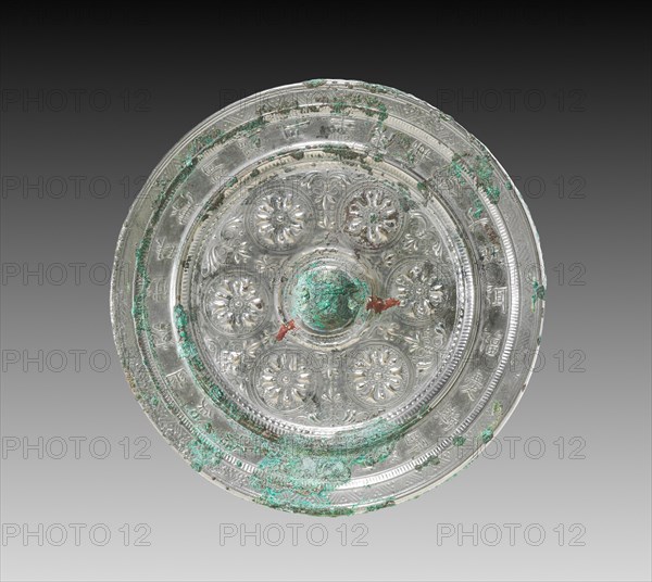 Mirror with Six Circular Flowers, 600s. China, Tang dynasty (618-907). Bronze; diameter: 16.6 cm (6 9/16 in.); overall: 1.5 cm (9/16 in.); rim: 0.9 cm (3/8 in.).