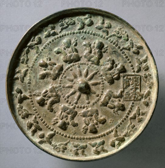 Mirror with Wheel Spokes and Riding Boys, c.1196-1234. China, Jin dynasty (1115-1234). Bronze; diameter: 13.3 cm (5 1/4 in.); overall: 0.8 cm (5/16 in.); rim: 0.7 cm (1/4 in.).