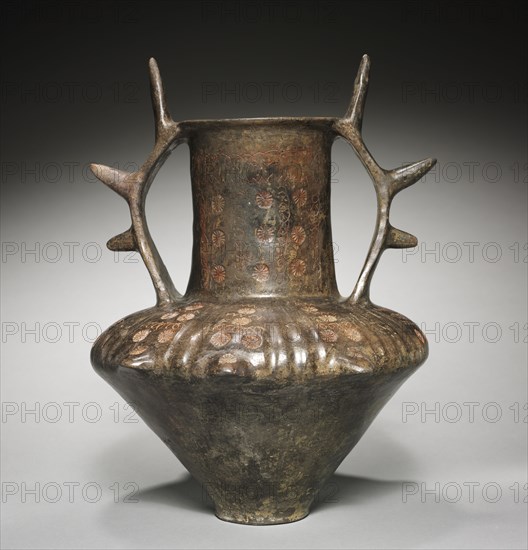 Amphora with Spiked Handles, 700-675 BC. Italy, Latium, Italic, 3rd quarter 7th Century BC. Brown impasto ceramic; diameter: 26.2 cm (10 5/16 in.); overall: 31.3 x 29.1 cm (12 5/16 x 11 7/16 in.).