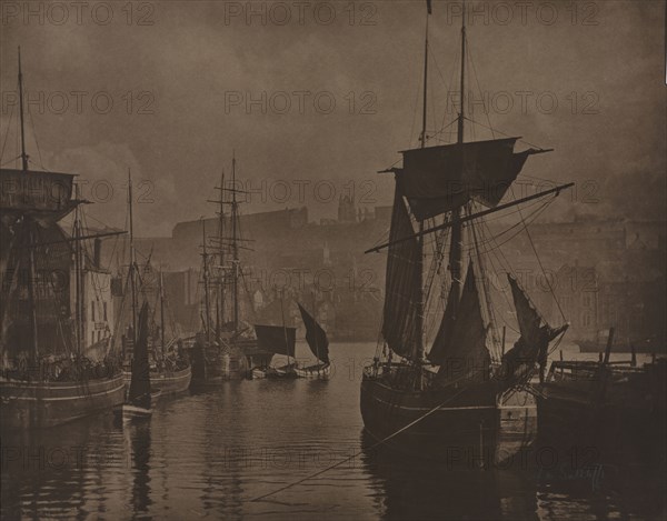 Whitby Harbor, c. 1885. Frank Meadow Sutcliffe (British, 1853-1941). Carbon print, toned, from glass negative; image: 34.3 x 44 cm (13 1/2 x 17 5/16 in.); paper: 34.8 x 44.5 cm (13 11/16 x 17 1/2 in.); matted: 55.9 x 66 cm (22 x 26 in.)
