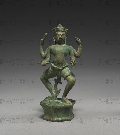 Four-Armed Standing Tantric Male Divinity, 2nd-3rd quarter of the 10th Century. Cambodia, Koh Ker/Khleang style. Bronze; overall: 12.1 cm (4 3/4 in.).