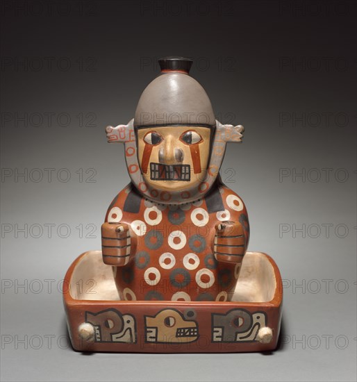 Figure in a Litter, 500-900. Wari (Pachacamac) style, Middle Horizon, Epoch 2. Earthenware with colored slips; overall: 26.3 x 21.6 x 24.8 cm (10 3/8 x 8 1/2 x 9 3/4 in.).