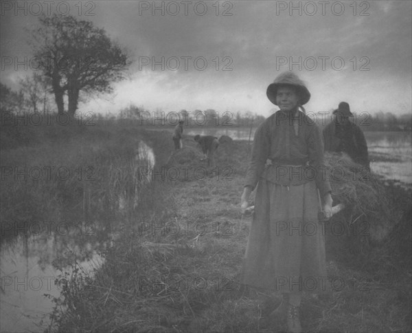 Life and Landscape on the Norfolk Broads (book): Poling the Marsh Hay, 1886. Peter Henry Emerson (British, 1856-1936), Sampson Low, Marston, Searle, and Rivington [with T. F. Goodall. Platinum print; image: 23.3 x 28.8 cm (9 3/16 x 11 5/16 in.); matted: 45.7 x 55.9 cm (18 x 22 in.)