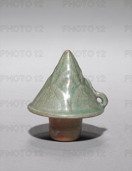 Lid for Bamboo Shoot-shaped Ewer, 1100s. Korea, Goryeo period (918-1392). Earthenware with carved designs and celadon glaze