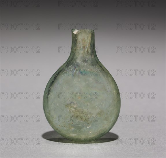 Pilgrim's Flask, 500-700. Byzantium, Syria-Palestine, 6th-7th century. Green glass; overall: 4.4 x 3.2 cm (1 3/4 x 1 1/4 in.)