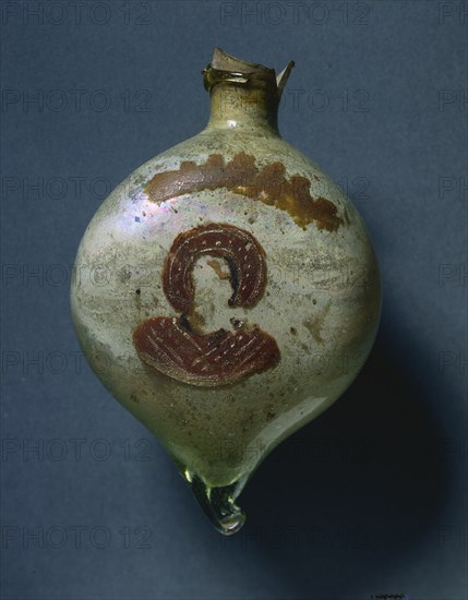 Pilgrim's Flask with Nimbed Figure, c. 400-600. Byzantium, Syria-Palestine, Byzantine period, 5th-7th Century. Opaque glass with paint; overall: 10.5 x 6.9 cm (4 1/8 x 2 11/16 in.)