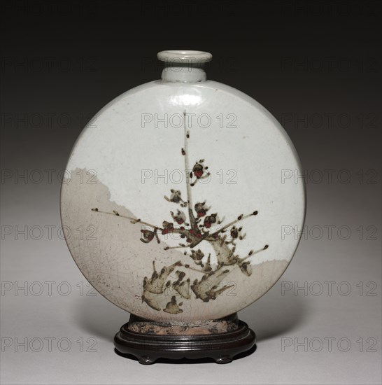 Wine Flask with Plum and Bamboo Design, 1600s. Korea, Joseon dynasty (1392-1910). Glazed porcelain with underglazed iron design; overall: 21.9 x 19 x 8.4 cm (8 5/8 x 7 1/2 x 3 5/16 in.).