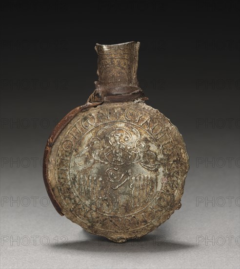 Pilgrim's Ampulla with Scenes of the Crucifixion (front) and the Ascension (back), c. 600. Byzantium; Palestine, early Byzantine period, early 7th Century. Tin-lead alloy with leather fragments; overall: 6.3 x 4.6 x 1.5 cm (2 1/2 x 1 13/16 x 9/16 in.).