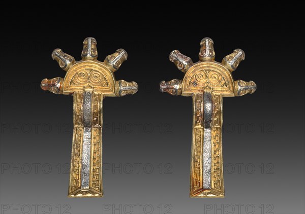 Pair of Fibulae, 500s-600s. Alemannic, Migration Period, 6th-7th century. Cast silver, parcel-gilt, with niello; overall: 10.5 x 6.5 x 2 cm (4 1/8 x 2 9/16 x 13/16 in.)