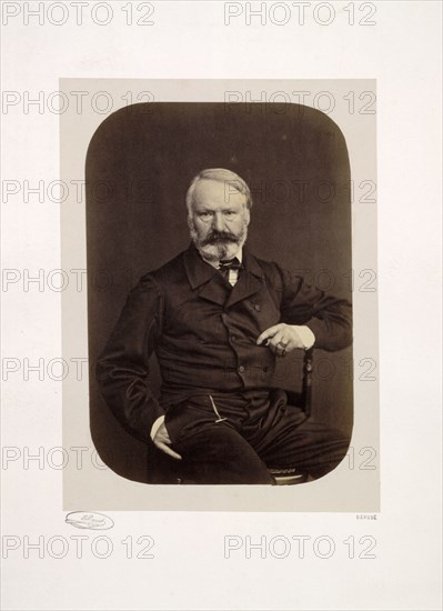 Portrait of Victor Hugo on Guernsey, 1862. Edmond Bacot (French, 1814-1875). Albumen print from wet collodion negative; image: 16 x 11 cm (6 5/16 x 4 5/16 in.); mounted: 31.7 x 22.3 cm (12 1/2 x 8 3/4 in.); paper: 18.1 x 13.2 cm (7 1/8 x 5 3/16 in.); matted: 45.7 x 35.6 cm (18 x 14 in.)