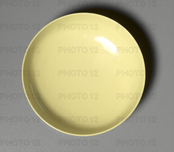Small Dish with Yellow Enamel, 1736-1795. China, Qing dynasty (1644-1911), Qianlong mark and reign (1735-1795). Enameled porcelain; diameter: 8.8 cm (3 7/16 in.); overall: 3 cm (1 3/16 in.).