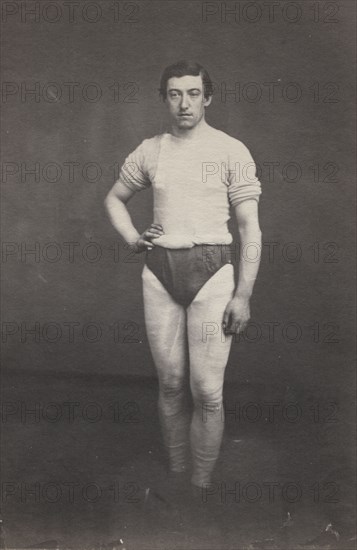 Young Man in Athletic Outfit, c.1857. Attributed to Oliver H. Willard (American, 1828-1875). Salted paper print from wet collodion negative; image: 21.5 x 16.5 cm (8 7/16 x 6 1/2 in.); paper: 22.4 x 17 cm (8 13/16 x 6 11/16 in.); matted: 50.8 x 40.6 cm (20 x 16 in.)