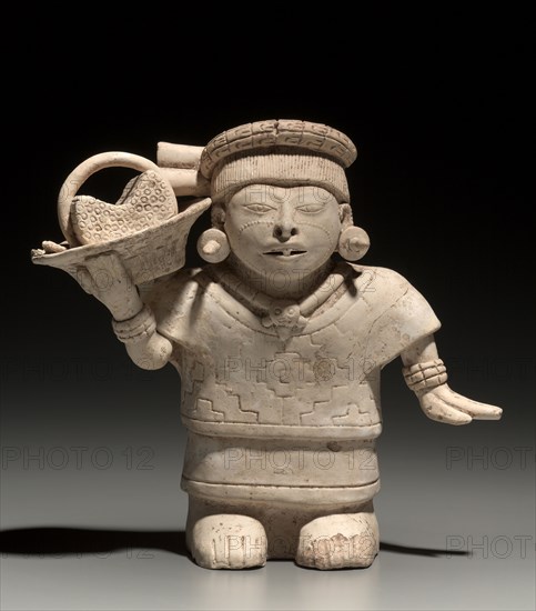 Standing Female with Basket, 600-1000. Mesoamerica, Veracruz, Nopiloa style, 7th-10th century. Ceramic, slip; overall: 19.8 x 21.4 x 8.4 cm (7 13/16 x 8 7/16 x 3 5/16 in.).