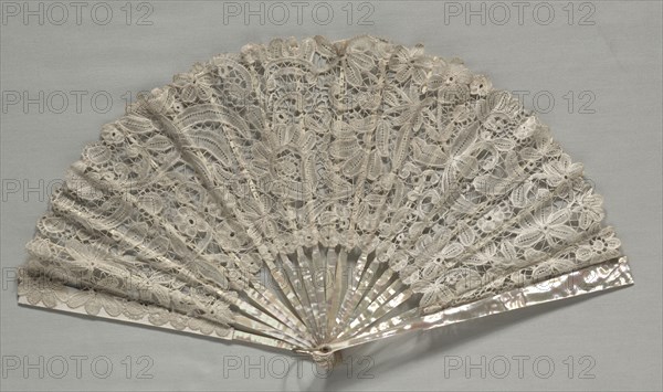 Lace Fan, c. 1860. Belgium, 19th century. Brussels bobbin lace; linen; frame: mother-of-pearl and ivory; overall: 30.5 x 50.8 x 3.2 cm (12 x 20 x 1 1/4 in.)