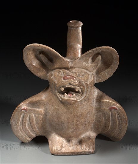Mastiff (Dog-Faced) Bat Vessel, 200-850. Central Andes, North Coast, Moche people, Early Intermediate period (0-700). Ceramic, slip; overall: 18.4 x 17.7 x 15.8 cm (7 1/4 x 6 15/16 x 6 1/4 in.)