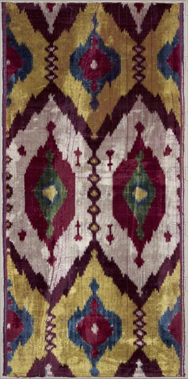Length of silk velvet ikat, 1875 - 1900. Uzbekistan, Bukhara, 1875 - 1900. Warp ikat, velvet weave; silk; mounted: 75.9 x 40.6 cm (29 7/8 x 16 in.); overall: 69.2 x 33.7 cm (27 1/4 x 13 1/4 in.).