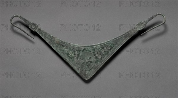 Woman's Belt Hanger (Zone), c. 725-675 BC. Greece, Geometric period (900- 700 BC). Bronze; overall: 32.5 cm (12 13/16 in.).
