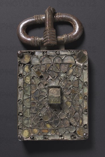 Belt Buckle, c. 525-560. Visigothic, Iberian Peninsula, Migration period, 6th century. Bronze and glass; overall: 12.8 x 6.7 x 2.4 cm (5 1/16 x 2 5/8 x 15/16 in.)