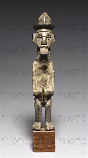 Male Figure, early 19th century. Central Republic of the Congo, Teke, 19th century. Wood; with base: 44 x 7 x 7 cm (17 5/16 x 2 3/4 x 2 3/4 in.)