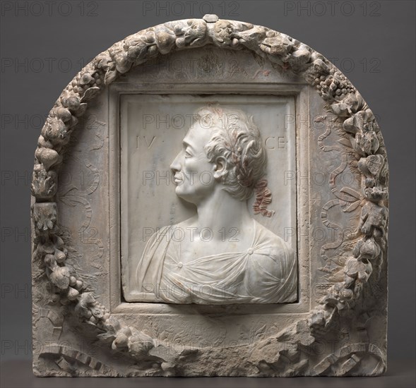 Julius Caesar, c. 1455-1460. Mino da Fiesole (Italian, c. 1430-1484), garland by Mino da Fiesole and Workshop (Italian, c. 1430-1484). Marble with traces of bole (red clay) and limestone with traces of paint; overall: 83 x 84 x 25 cm (32 11/16 x 33 1/16 x 9 13/16 in.).