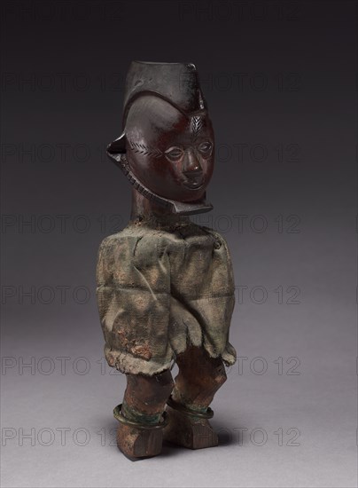 Male Figure, late 1800s-early 1900s. Central Africa, Republic of the Congo or Democratic Republic of the Congo, Teke people. Wood, fabric, brass; overall: 23.5 x 7.5 x 8 cm (9 1/4 x 2 15/16 x 3 1/8 in.); without base: 23.3 cm (9 3/16 in.)