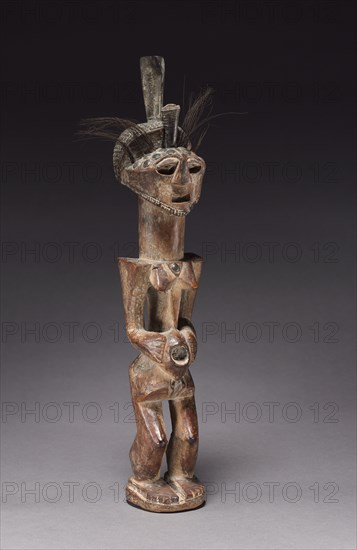 Female Figure, late 1800s-early 1900s. Africa, Democratic Republic of the Congo, Songye people. Wood, brass, animal hair, antelope tusk; overall: 34.8 x 6.2 x 14.5 cm (13 11/16 x 2 7/16 x 5 11/16 in.)