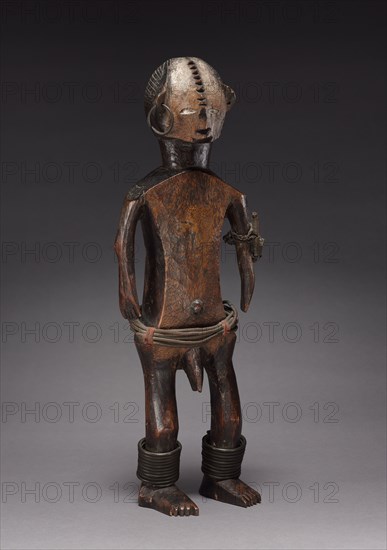 Male Figure of a Pair, late 1800s-early 1900s. Central Africa, Democratic Republic of the Congo, probably Ngbandi people. Wood, copper, glass beads, iron, fabric; overall: 45 x 15.5 x 9.2 cm (17 11/16 x 6 1/8 x 3 5/8 in.)