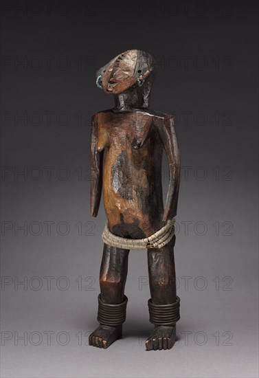 Female Figure of a Pair, late 1800s-early 1900s. Central Africa, Democratic Republic of the Congo, Ngbandi people. Wood, copper, glass beads, iron, fabric; overall: 41 x 13 x 11.5 cm (16 1/8 x 5 1/8 x 4 1/2 in.)