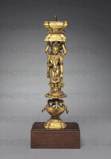 Support with Addorsed Figures, 1400s. Tibet, Densatil Monastery, 15th century. Gilt bronze; overall: 33.5 x 9.5 x 8 cm (13 3/16 x 3 3/4 x 3 1/8 in.).