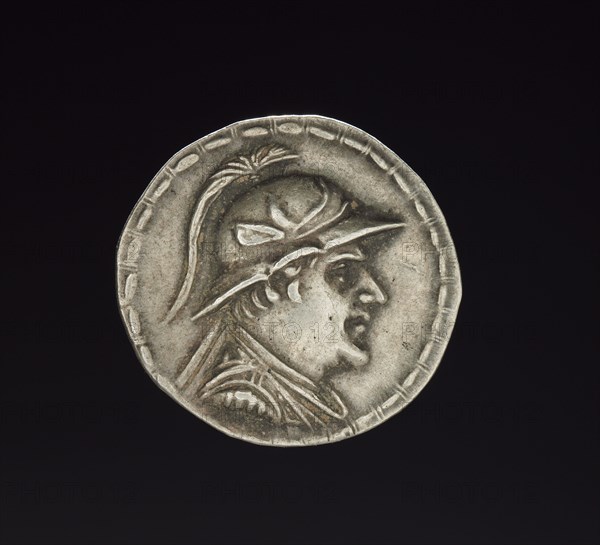 Coin of Eukratides I, 170-145 BC. Afghanistan, Bactria, c. 2nd century BC. Silver; diameter: 3.3 x 0.5 cm (1 5/16 x 3/16 in.).