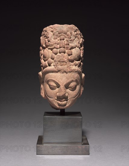 Head of Surya, c. 6th century. India, Mathura, Post-Gupta period. Spotted red sandstone; overall: 16 x 8.5 x 12 cm (6 5/16 x 3 3/8 x 4 3/4 in.).