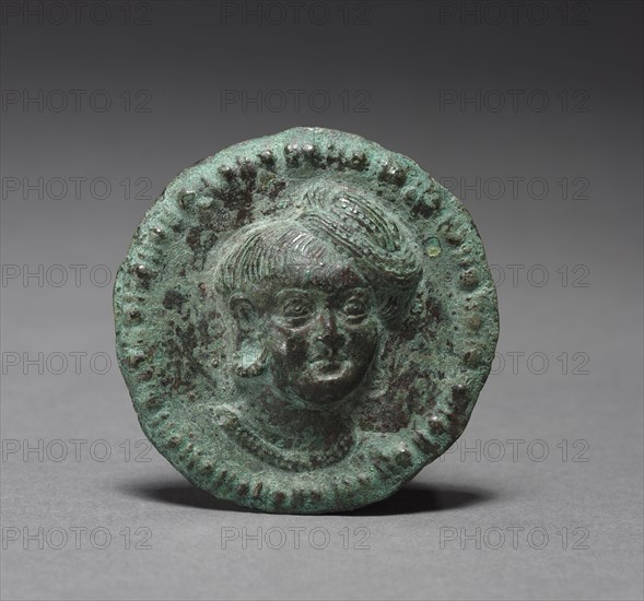 Roundel, c. 1st century BC. India, Satavahana Period, c. 1st century BC. Bronze with repousse and chased designs; diameter: 1.8 x 6.9 cm (11/16 x 2 11/16 in.); overall: 1.8 cm (11/16 in.).