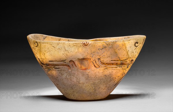 Carved Bowl, 1200-300 BC. Mesoamerica, reportedly the Tepecoacuilco River Valley, Guerrero, Olmec style (1200-300 BC), Formative Period. Stone (travertine); overall: 13.3 x 23.5 x 10.2 cm (5 1/4 x 9 1/4 x 4 in.).