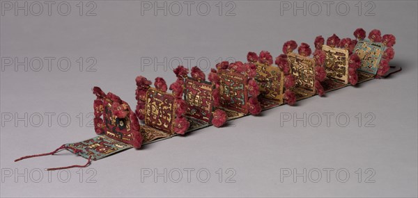 Band (Headband?), c. 650-850. Central Andes, Moche-Wari Style, mid-7th to mid-9th century. Camelid fiber (alpaca; weft) and cotton (warp); tapestry weave; overall: 59.4 x 10.8 x 8.3 cm (23 3/8 x 4 1/4 x 3 1/4 in.)