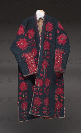 Woman's robe with crimson flora, late 1800s. Uzbekistan, Karakapak Republic, Khorezm. Plain weave:  cotton (hand-spun, indigo dyed), embroidery: silk, cotton; tablet-woven (edges); neck edge to hem: 119.4 cm (47 in.); width across shoulders: 158.1 cm (62 1/4 in.).