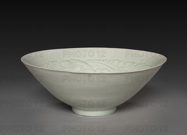 Conical Bowl with Carved Babies and Floral Motif, 960-1279. China, Song dynasty (960-1279). Porcelain with pale bluish-white glaze, qingbai ("blue-white") ware; overall: 7.8 x 20.3 cm (3 1/16 x 8 in.); diameter: 21.6 cm (8 1/2 in.).