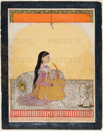 Seated Lady Smoking a Hookah, c. 1780. Northern India, Himachal Pradesh, Pahari Kingdom of Guler. Opaque watercolor and gold on paper; page: 32.3 x 25.4 cm (12 11/16 x 10 in.); miniature: 27.7 x 20.7 cm (10 7/8 x 8 1/8 in.).