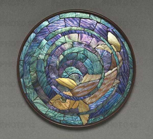 Round Mosaic Trivet (fish), c. 1895-1902. Tiffany Glass and Decorating Company. Glass, bronze; overall: 1.3 x 17.8 cm (1/2 x 7 in.).
