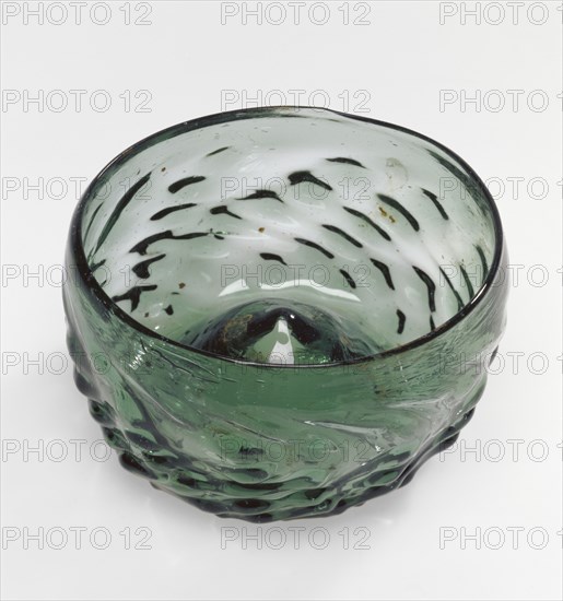 Drinking Bowl, Maigelein, Germany; 15th century; Mold-blown dark green glass; 4.9 x 9 cm, 1 15,16 x 3 9,16 in