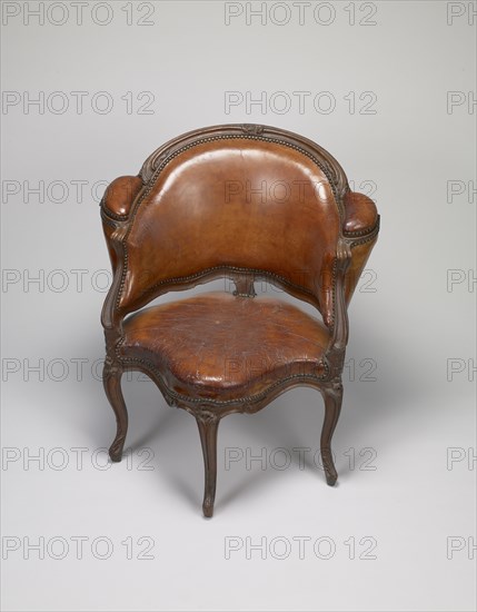 Desk Chair; Attributed to Étienne Meunier, Menuisier, French, master 1732), Paris, France; about 1735; Walnut with leather