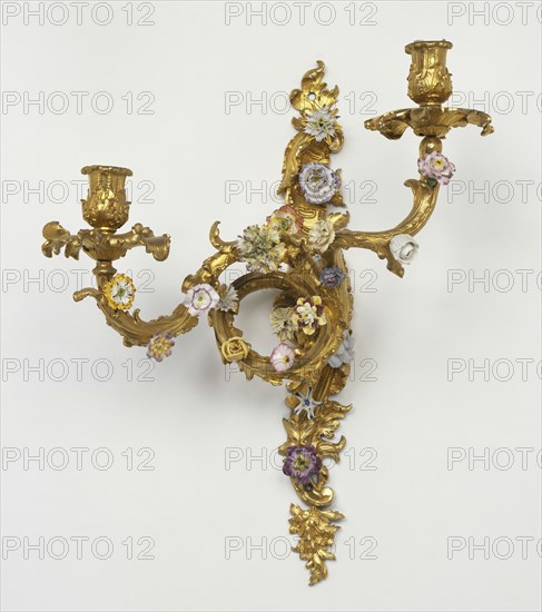 Wall Light; Paris, France; about 1750; Soft-paste porcelain; gilt bronze; 45.7 x 34.3 x 19.7 cm, 18 x 13 1,2 x 7 3,4 in