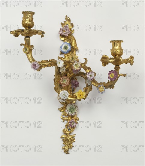 Wall Light; Paris, France; about 1750; Soft-paste porcelain; gilt bronze; 45.7 × 34.3 × 19.7 cm, 18 × 13 1,2 × 7 3,4 in