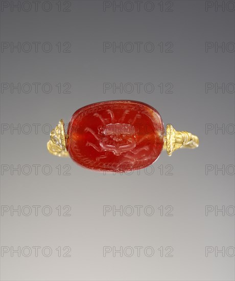 Engraved Scaraboid; Greece; mid-2nd half 6th century B.C; Carnelian; 0.5 × 1.1 × 0.8 cm, 3,16 × 7,16 × 5,16 in