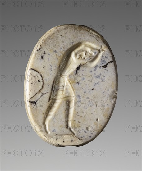 Scaraboid; Pendants Group; about 400 B.C; Mottled grey-white chalcedony; 0.9 × 2.5 × 1.9 cm, 3,8 × 1 × 3,4 in