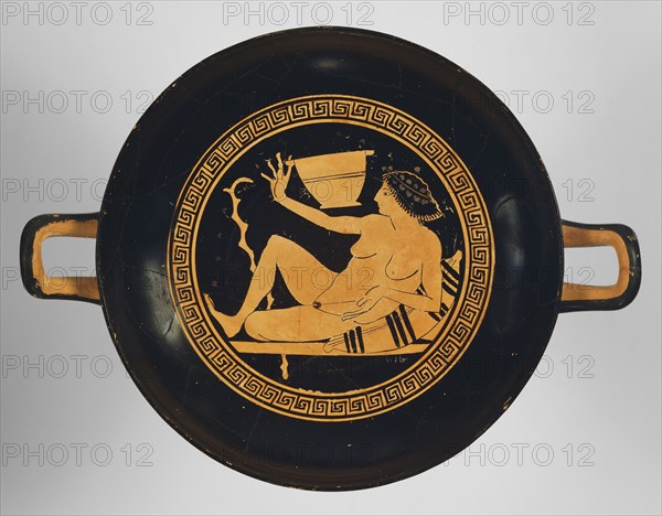 Wine Cup with a Woman Playing a Game; Attributed to Onesimos, Greek, Attic, active 500 - 480 B.C., Athens, Greece; about 490 B