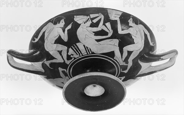 Wine Cup with a Woman Playing a Game; Attributed to Onesimos, Greek, Attic, active 500 - 480 B.C., Athens, Greece; about 490 B