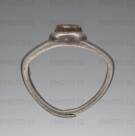 Engraved Gem Inset Into A Ring; 3rd century; Gem: carnelian; ring: silver; 0.7 × 0.6 × 0.3 cm, 1,4 × 3,16 × 1,8 in