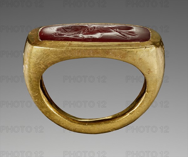 Ring with an Engraved Gem; 1st century B.C; Gem: ruby red carnelian: ring: gold; 2.2 × 1.3 × 0.3 cm, 7,8 × 1,2 × 1,8 in